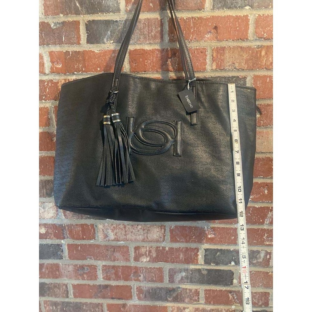 BEBE-BLACK-MADISON EMBOSSED TOTE-LARGE LOGO ON FRONT-GOLD TONE FEET-ZIP TOP-NWT